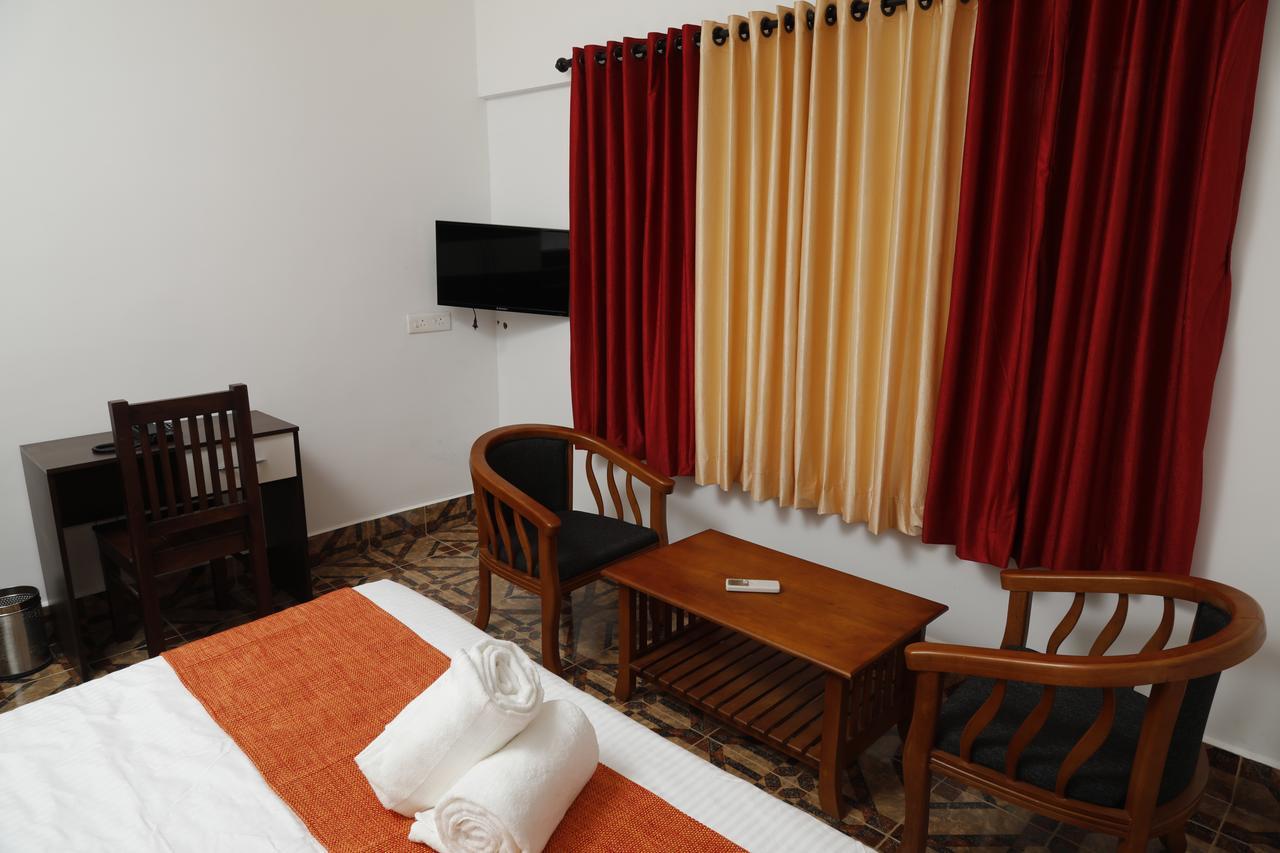 Puthens Clifton Inn Kottayam Zewnętrze zdjęcie