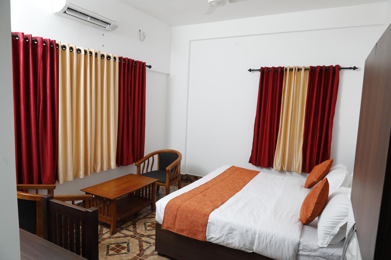 Puthens Clifton Inn Kottayam Zewnętrze zdjęcie
